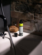 BOY, HYDRATE zinc face gel in a bathroom.